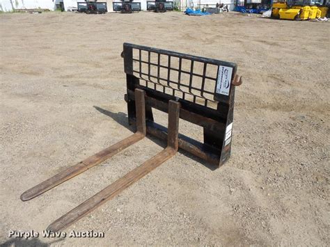 pallet forks for cat skid steer|caterpillar pallet forks.